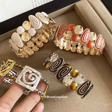 Spiral Enamel Stretch Bracelets With Metal Heart Filigree