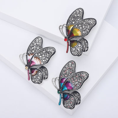 Crystal Wing Butterfly Brooch shown against a white display background