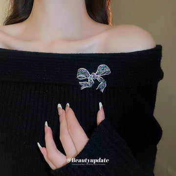 Silver Tone Bow Brooch With Purple Green And Blue Crystals