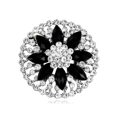 Front product view of black and white crystal flower brooch