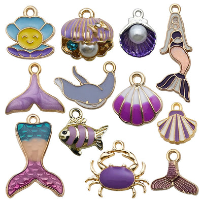Colorful seashell and starfish charms arranged on a light background