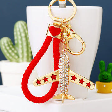 Crystal Star Fighter Plane Keychains in Gold and Silver with Braided Loops