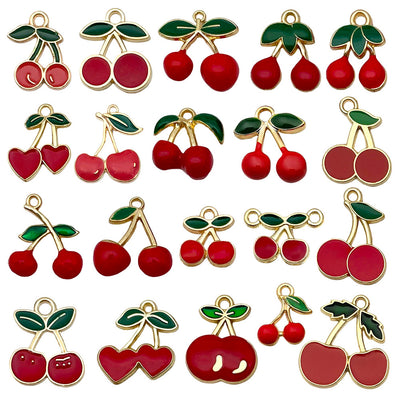 Colorful cherry charms arranged on a light background