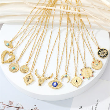 Gold Tone Vintage Motif Pendant Necklaces in Twelve Eye and Symbol Designs
