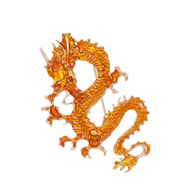 Front product view of the dragon brooch pin in gold