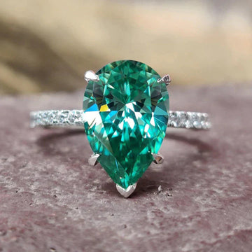 Green Pear-Shaped Solitaire Pave Ring In Polished Silver Tone