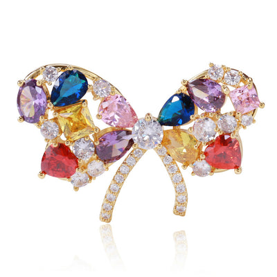Gold multicolor crystal bow brooch front view on white background