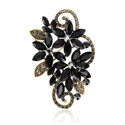 Product display showing a curling grape cluster formed from large faceted marquise crystals