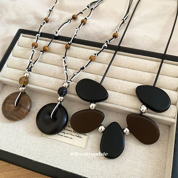Black and Brown Cord Necklaces with Round Wood Look Pendants