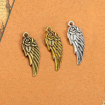 Rose and Feathered Wing Metal Charm in Three Finishes