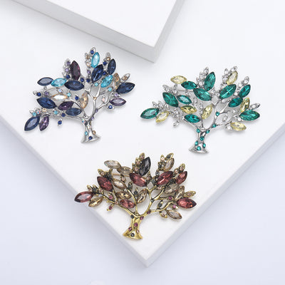 Front view of a branching tree filled with marquise crystal leaves