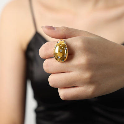 Gold multicolor crystal dome teardrop ring worn on hand