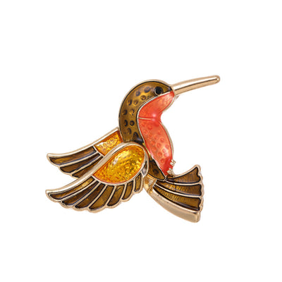 Front product view of the bird brooch pin in gold and red