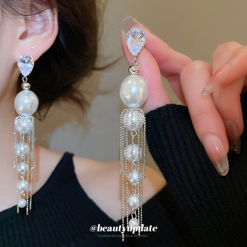 Silver Tone Pearl Drop Earrings With Fine Chain Tassels