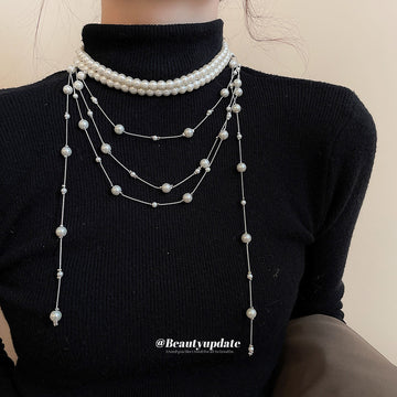 Layered Pearl Strand Tassel Necklace with Distinctive Textured Details