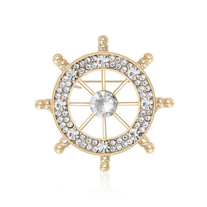 Crystal Ship Wheel Brooch With Open Spokes and Metal Rim