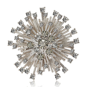 Silver Tone Starburst Brooch with Radiating Clear Crystals