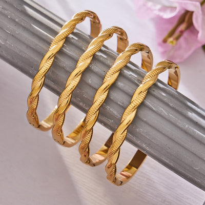 Gold multi-coil twisted wrap clasp bangle on metal rod