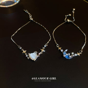 Silver Tone Star Bracelet With Blue Moon Or White Heart Center