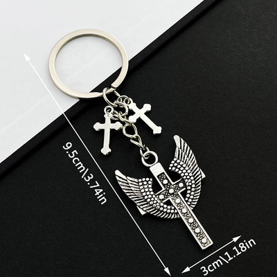 Main display of silver tone winged cross and small cross keychain