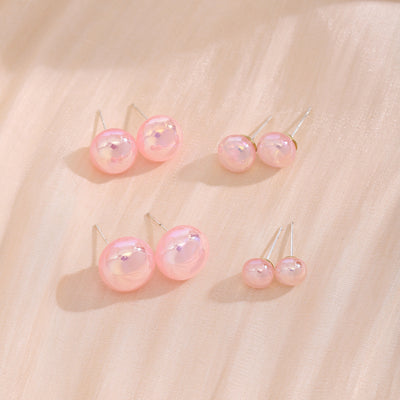 Primary supplied view of pink pearl-look round studs
