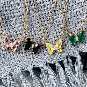 Faceted Butterfly Pendant Necklace in Polished Metal