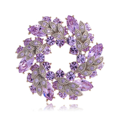 Front product view of the floral wreath brooch pin in purple and silver