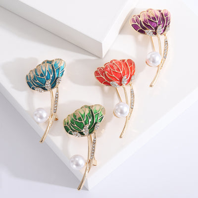 Flower Bud brooch shown in the available finishes