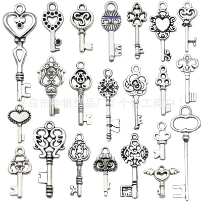 Metallic heart charms arranged on a light background