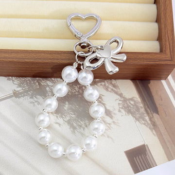 Pearl Beaded Bag Charm With Heart Shaped Clasp And Bow