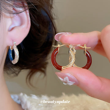 Brown Enamel Twisted Hoop Earrings With Decorative Metal Details