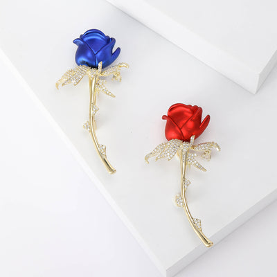 Enamel Rose Stem Brooch shown against a white display background