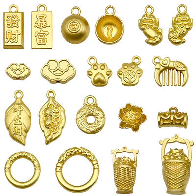 Yellow assorted shape charms arranged on a light background