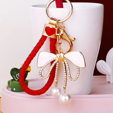 White Enamel Bow Keychains in Plain and Three Braided Loop Options