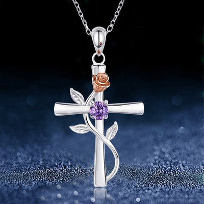 Purple stone cross rose vine pendant on dark glitter background