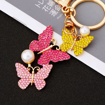 Three Butterfly Drop Keychains in Pink Yellow Purple and White Crystal Palettes