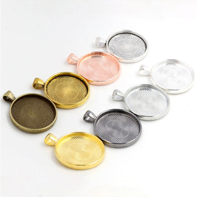 Overview of round recessed trays with patterned backs and broad top bails, offered in nine distinct metal finishes
