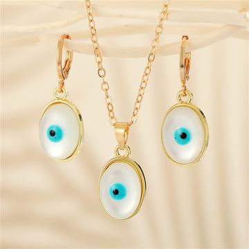 Gold Tone Oval Pearl Blue Evil Eye Pendant Necklace and Earrings