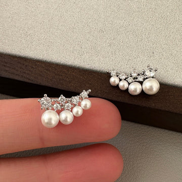Pair of Metal Tone Pearl Cluster Stud Earrings with Crystal Leaves