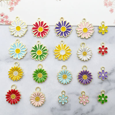 Colorful daisy charms arranged on a light background