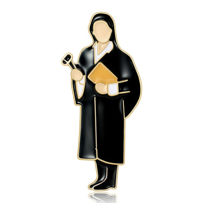 Black enamel lawyer figure brooch front on white