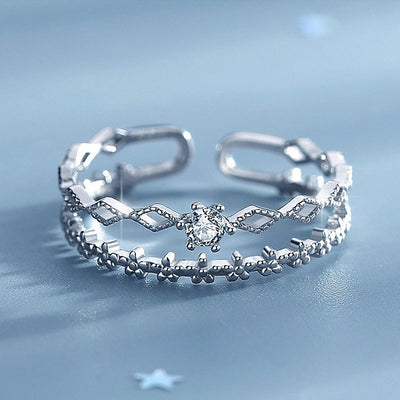 Silver dual open ring front view floral band lattice band clear stone