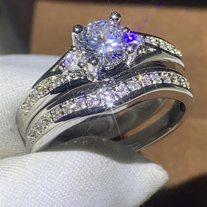 Round Solitaire Curved Two-Ring Set In Polished Silver Tone