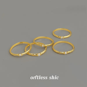 Gold Tone Slim Textured Band And Clear Square Stone Ring