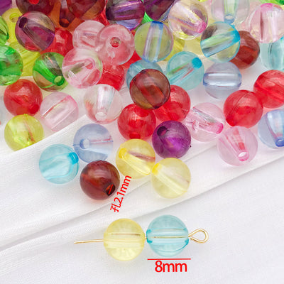 Front product photo of eight millimeter translucent round acrylic bead showing the pictured design arrangement