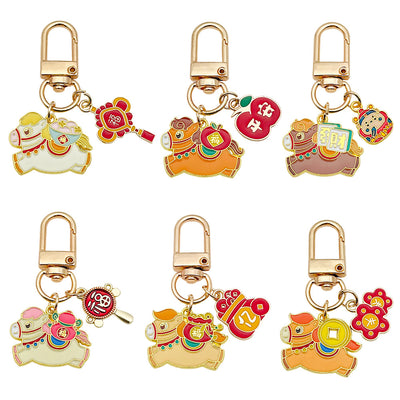 Image 5 showing a set of four different key chains with various designs.