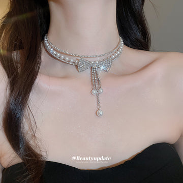 Silver Tone Crystal Bow Choker Necklace with Pearl Like Drops