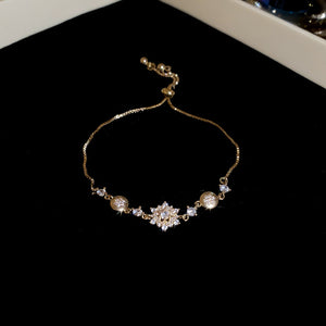Snowflake Center Crystal Slider Bracelet In Gold Tone Or Silver Tone