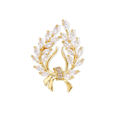 Front view of the wheat wreath metal brooch