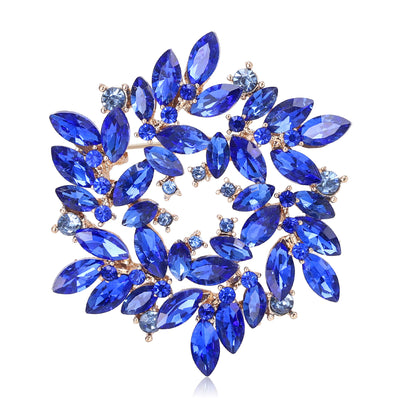 Front view of a circular wreath formed from marquise-cut crystal leaves